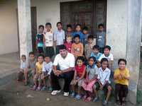 Orphanage Director Dipak Adhikari with the Children