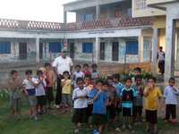 Orphanage Director Dipak Adhikari with the Children